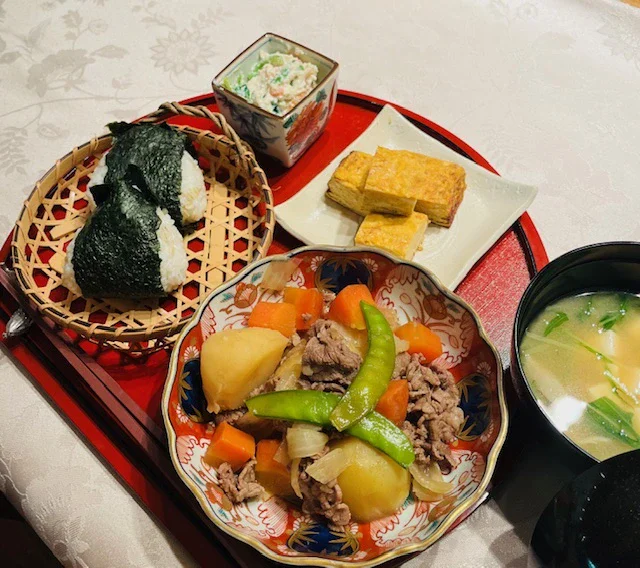 Basic Course meal: nikujaga, onigiri, dashimaki tamago, shiraae and miso soup